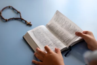 kid holding bible