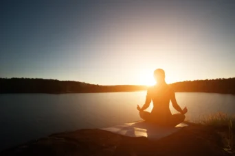 sunrise yoga meditating