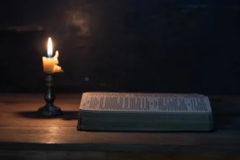 bible with candle