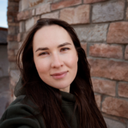 woman standing near the wall