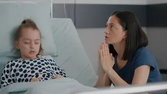mother praying for sick daughter hospital